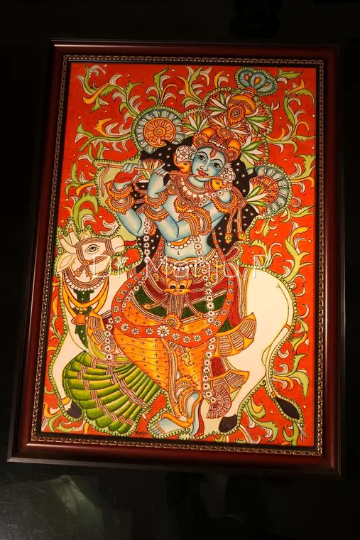 SREEKRISHNA and the Cow — Kerala mural painting on canvas by Dr. Manju P: Krishna in tribhanga with his flute, the white cow turning to listen