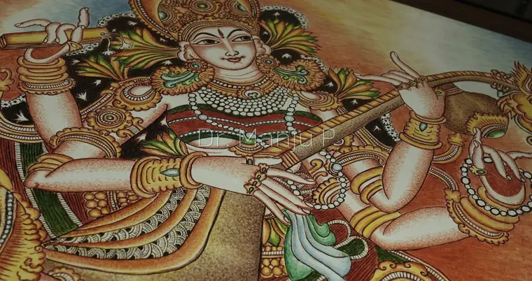 Saraswati on the Lotus — Kerala mural detail: Close view — the serene face, tiered kiritam, pearl strands and the four arms on the veena
